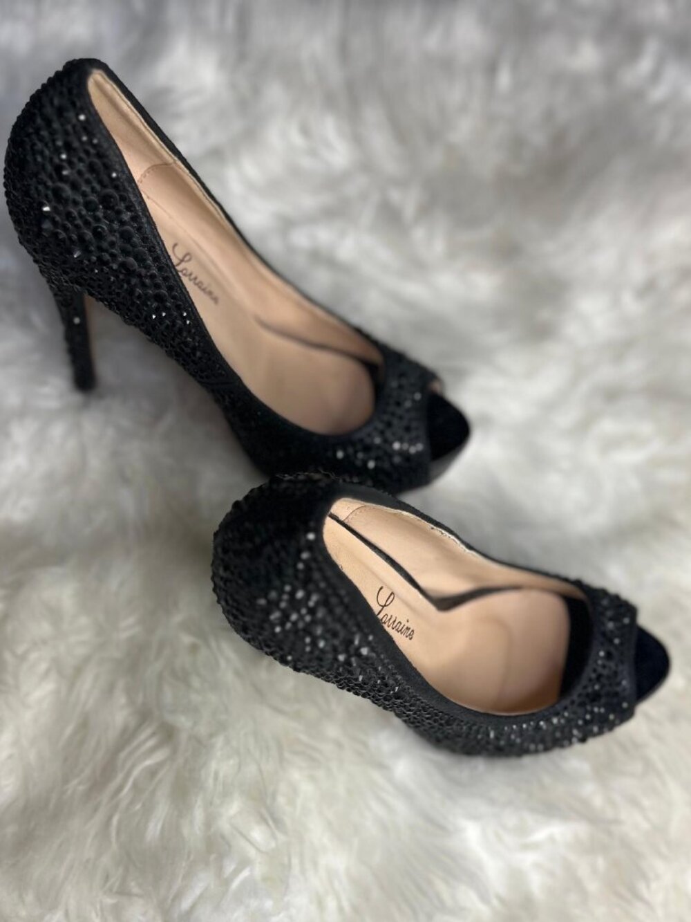 Turn heads at your next formal event with these spectacular Lauren Lorraine "Can
